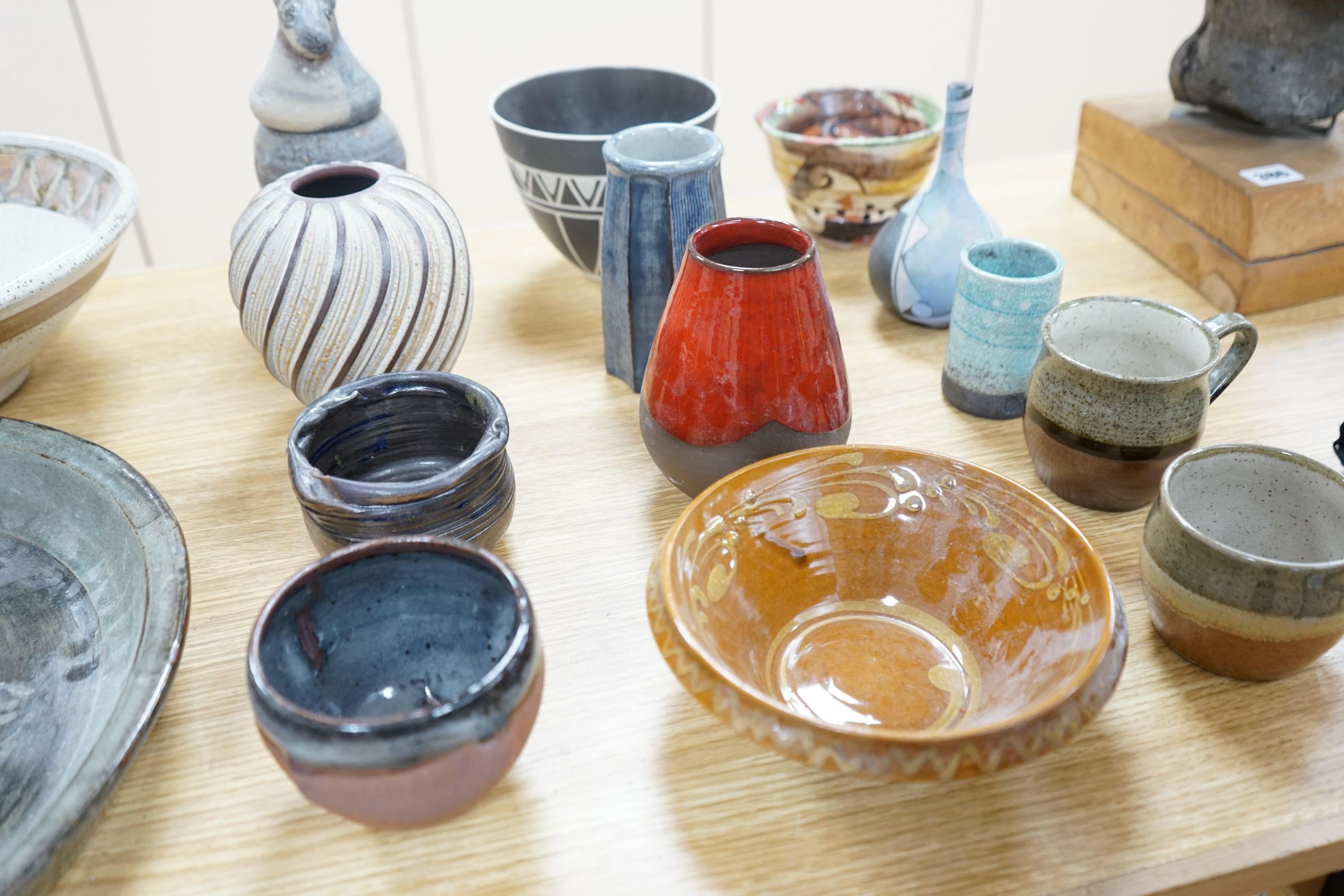 A group of studio pottery dishes, bowls and vases to include- 38cm